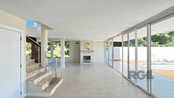 Casa Condominio em Porto Alegre, no bairro Hípica, com 3 dormitório(s), e 3 banheiros, à venda.