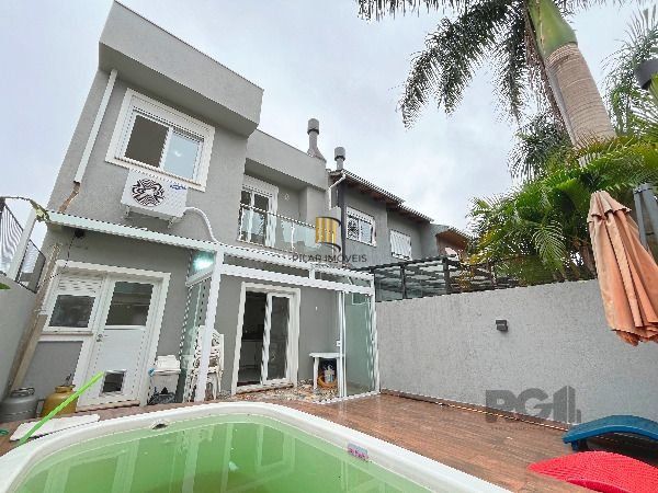 Casa em Porto Alegre, no bairro Hípica, com 3 dormitório(s), e 3 banheiros, à venda.