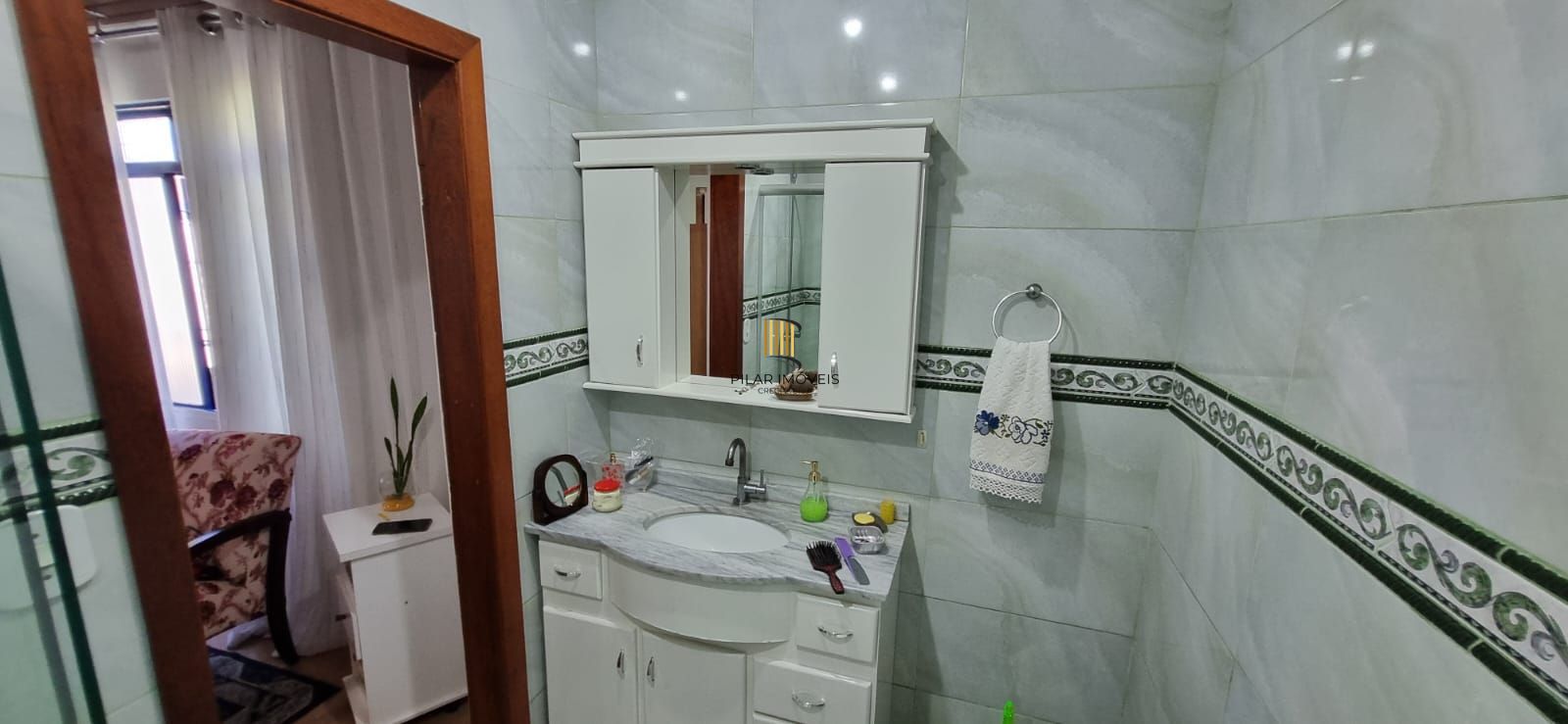Casa com pavilhão