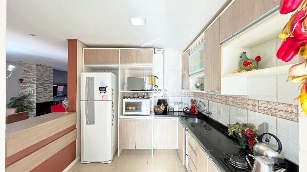 Casa Condominio em Porto Alegre, no bairro Vila Nova, com 3 dormitório(s), e 3 banheiros, à venda.