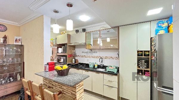 Casa Condominio em Porto Alegre, no bairro Hípica, com 3 dormitório(s), e 3 banheiros, à venda.