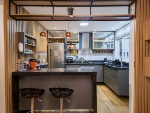 Casa em Porto Alegre, no bairro Vila Conceição, com 3 dormitório(s), e 3 banheiros, à venda.