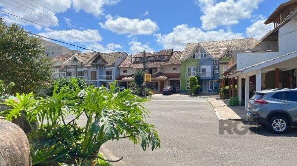 Casa Condominio em Porto Alegre, no bairro Cavalhada, com 3 dormitório(s), e 3 banheiros, à venda.