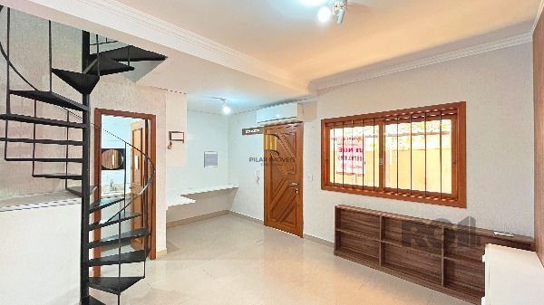 Casa Condominio em Porto Alegre, no bairro Coronel Aparício Borges, com 2 dormitório(s), e 2 banheiros, à venda.