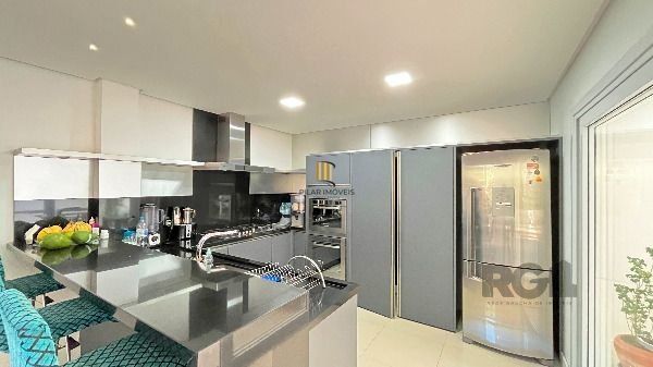 Casa Condominio em Porto Alegre, no bairro Hípica, com 3 dormitório(s), e 3 banheiros, à venda.