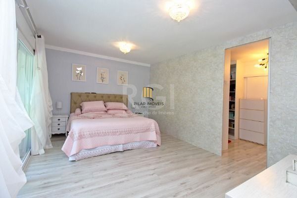 Casa Condominio em Porto Alegre, no bairro Hípica, com 3 dormitório(s), e 3 banheiros, à venda.