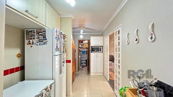 Casa Condominio em Porto Alegre, no bairro Santa Tereza, com 3 dormitório(s), e 3 banheiros, à venda.