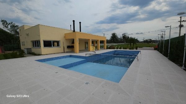 Casa Condominio em Porto Alegre, no bairro Hípica, com 3 dormitório(s), e 3 banheiros, à venda.