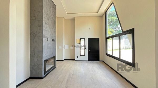 Casa em Porto Alegre, no bairro Hípica, com 3 dormitório(s), e 3 banheiros, à venda.