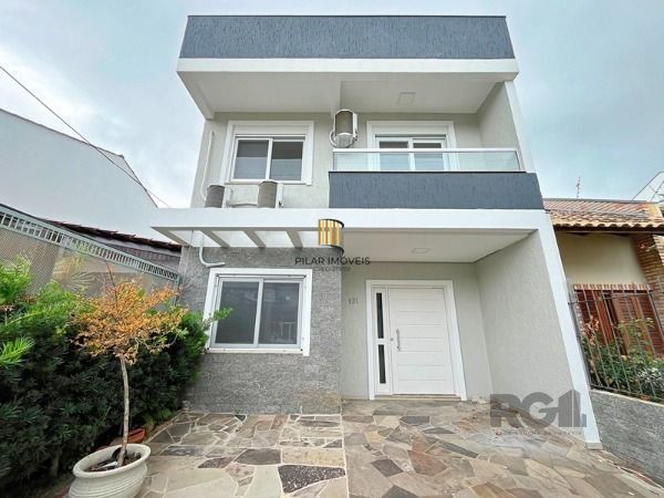 Casa em Porto Alegre, no bairro Hípica, com 3 dormitório(s), e 3 banheiros, à venda.