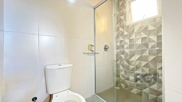 Casa Condominio em Porto Alegre, no bairro Ipanema, com 3 dormitório(s), e 3 banheiros, à venda.