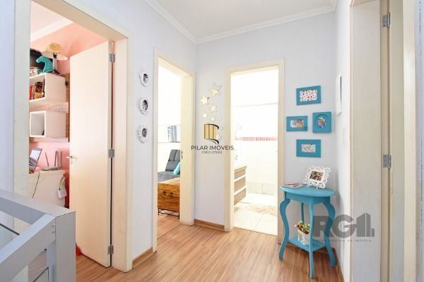 Casa Condominio em Porto Alegre, no bairro Vila Nova, com 3 dormitório(s), e 3 banheiros, à venda.