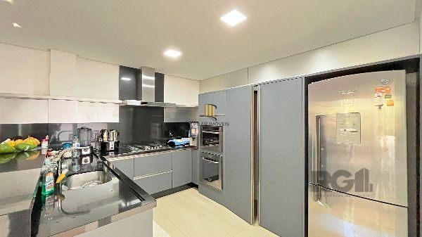 Casa Condominio em Porto Alegre, no bairro Hípica, com 3 dormitório(s), e 3 banheiros, à venda.
