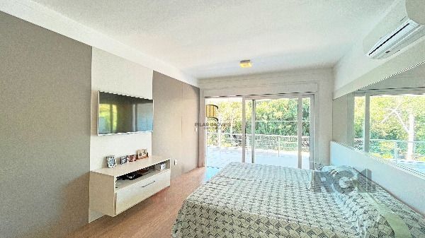 Casa Condominio em Porto Alegre, no bairro Hípica, com 3 dormitório(s), e 3 banheiros, à venda.