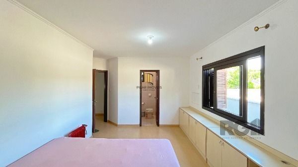 Casa 4 dormitórios no bairro Camaquã