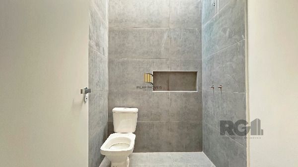 Casa em Porto Alegre, no bairro Hípica, com 3 dormitório(s), e 3 banheiros, à venda.