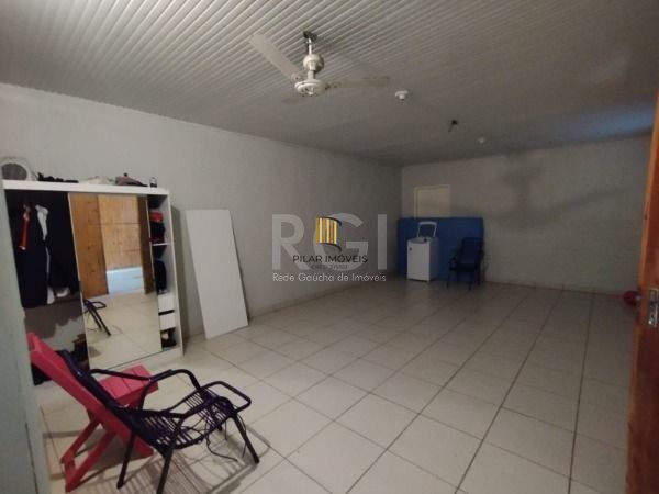 Casa em Porto Alegre, no bairro Belém Novo, com 5 dormitório(s), e 5 banheiros, à venda.