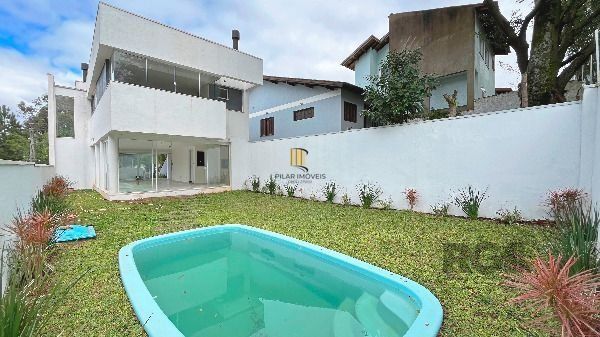 Casa Condominio em Porto Alegre, no bairro Hípica, com 3 dormitório(s), à venda.