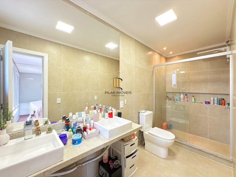 Casa 4 dormitórios no bairro Camaquã