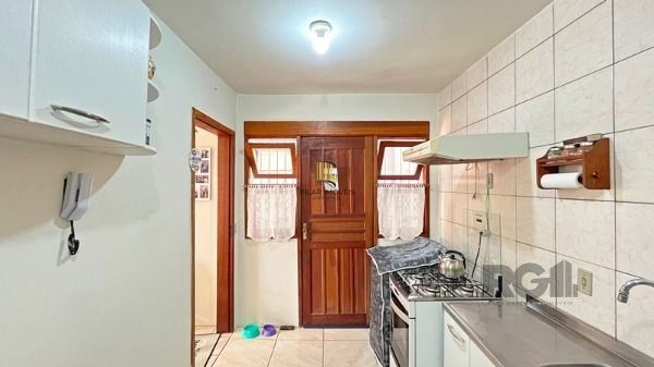 Casa Condominio em Porto Alegre, no bairro Tristeza, com 3 dormitório(s), e 3 banheiros, à venda.