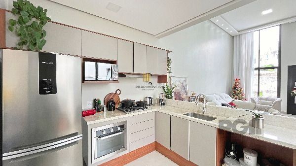 Casa Condominio em Porto Alegre, no bairro Hípica, com 3 dormitório(s), à venda.