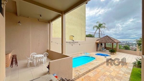 Casa 3 dormitórios no bairro Nonoai