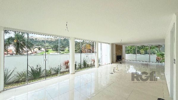 Casa Condominio em Porto Alegre, no bairro Hípica, com 3 dormitório(s), à venda.