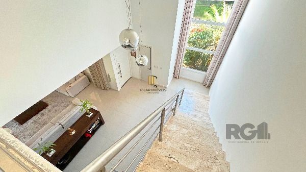 Casa Condominio em Porto Alegre, no bairro Hípica, com 3 dormitório(s), e 3 banheiros, à venda.