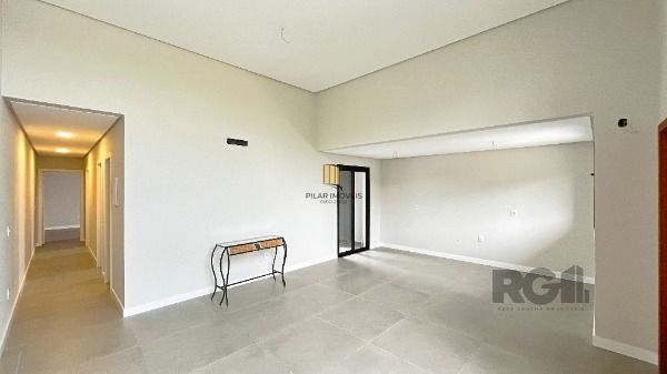 Casa em Porto Alegre, no bairro Hípica, com 3 dormitório(s), e 3 banheiros, à venda.