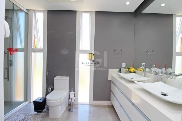 Casa Condominio em Porto Alegre, no bairro Hípica, com 3 dormitório(s), e 3 banheiros, à venda.