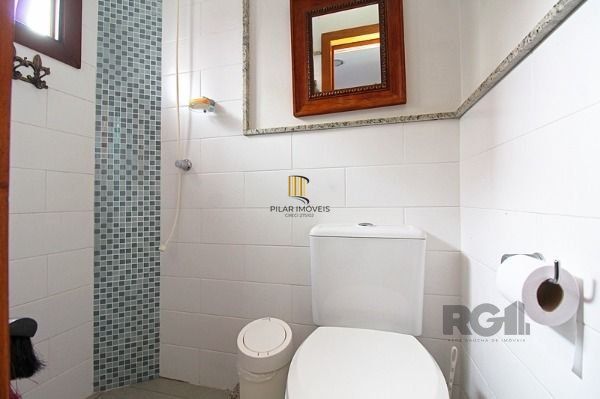Casa em Porto Alegre, no bairro Hípica, com 3 dormitório(s), e 3 banheiros, à venda.