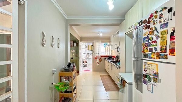 Casa Condominio em Porto Alegre, no bairro Santa Tereza, com 3 dormitório(s), e 3 banheiros, à venda.