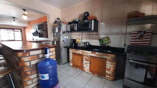 Casa em Porto Alegre, no bairro Hípica, com 3 dormitório(s), à venda.