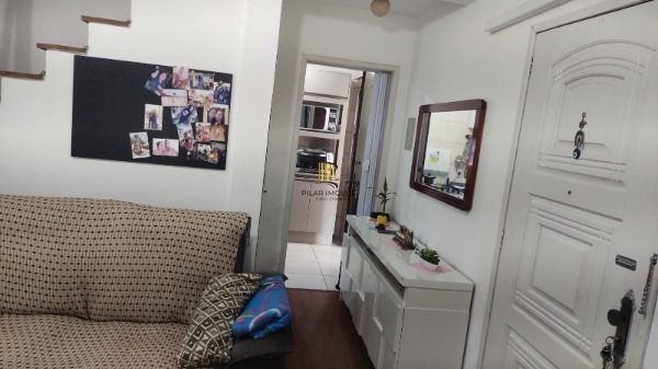 Casa Condominio em Porto Alegre, no bairro Tristeza, com 3 dormitório(s), e 3 banheiros, à venda.