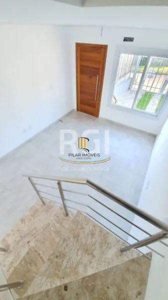 Casa 3 dormitórios no bairro Guarujá