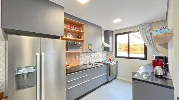 Casa 3 dormitórios no bairro Hípica