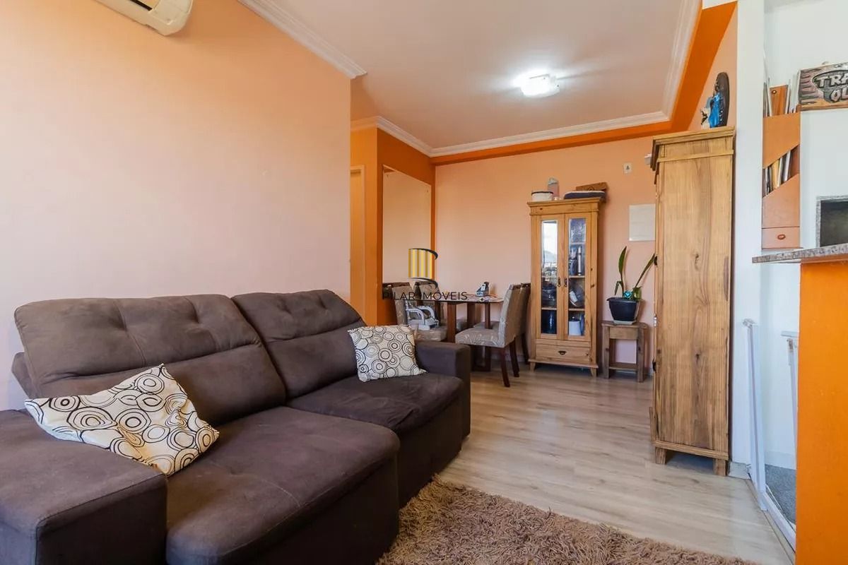 Apartamento 2 dormitórios, com suíte, churrasqueira, e vaga escriturada.