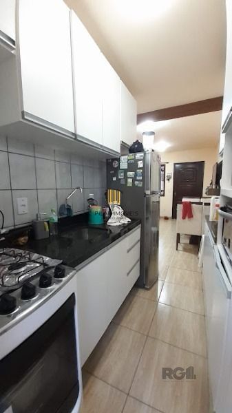 Casa Condominio em Porto Alegre, no bairro Vila Nova, com 3 dormitório(s), à venda.