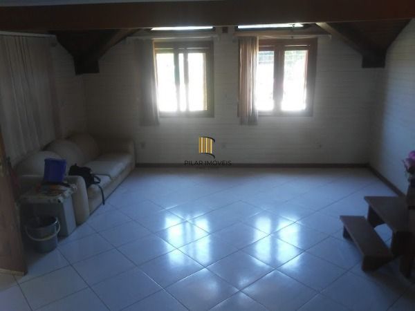 Casa 3 dormitórios no bairro Guarujá