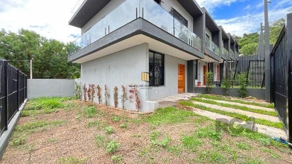 Casa Condominio em Porto Alegre, no bairro Tristeza, com 3 dormitório(s), e 3 banheiros, à venda.