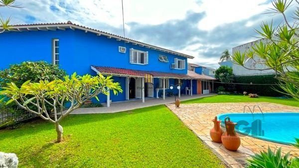Casa em Porto Alegre, no bairro Ipanema, com 3 dormitório(s), à venda.