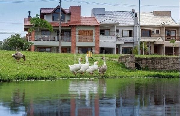 Casa Condominio em Porto Alegre, no bairro Hípica, com 4 dormitório(s), e 4 banheiros, à venda.