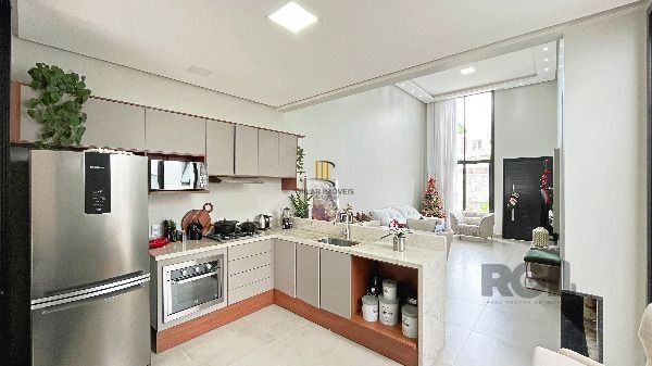 Casa Condominio em Porto Alegre, no bairro Hípica, com 3 dormitório(s), à venda.