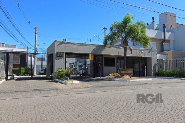 Casa em Porto Alegre, no bairro Hípica, com 3 dormitório(s), e 3 banheiros, à venda.