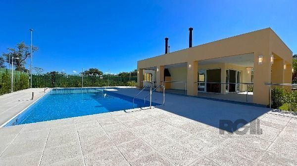 Casa Condominio em Porto Alegre, no bairro Hípica, com 3 dormitório(s), e 3 banheiros, à venda.