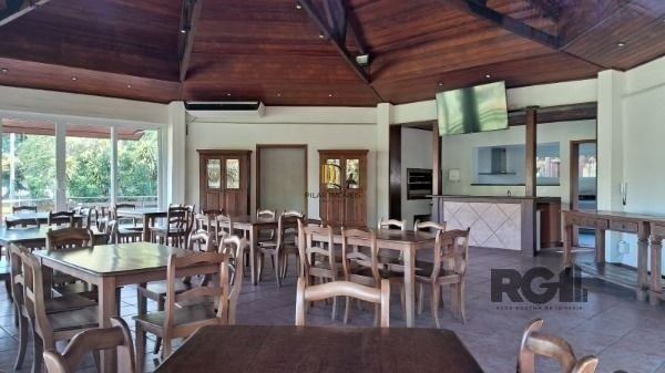 Casa Condominio em Porto Alegre, no bairro Cavalhada, com 4 dormitório(s), e 4 banheiros, à venda.