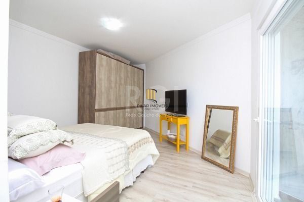 Casa Condominio em Porto Alegre, no bairro Hípica, com 3 dormitório(s), e 3 banheiros, à venda.