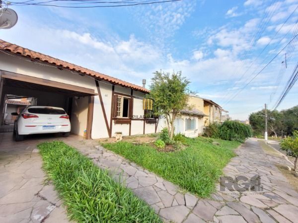 Casa Condominio em Porto Alegre, no bairro Hípica, com 3 dormitório(s), e 3 banheiros, à venda.
