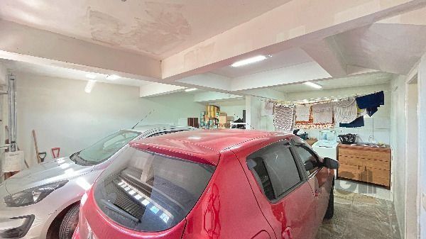 Casa em Porto Alegre, no bairro Hípica, com 3 dormitório(s), e 3 banheiros, à venda.