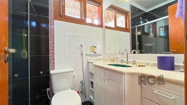 Casa Condominio em Porto Alegre, no bairro Santa Tereza, com 3 dormitório(s), e 3 banheiros, à venda.